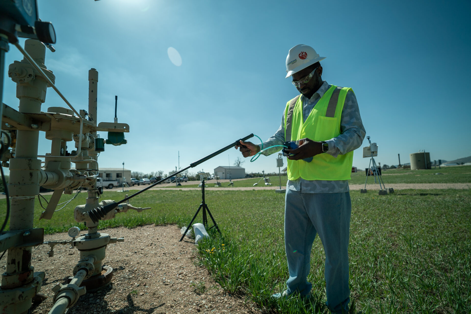 A research scientist with a methane sensor