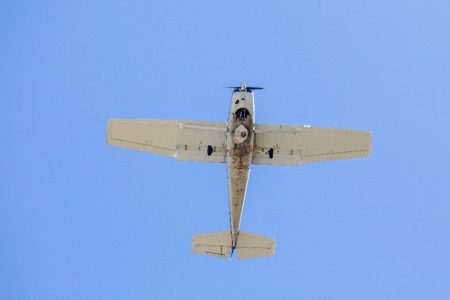 fixed winged aircraft flying overhead